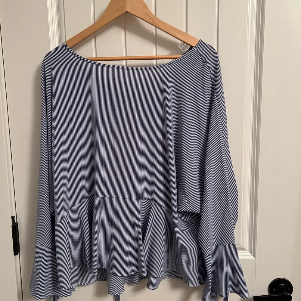 Lined blue and white blouse loose and flowy. Very cute